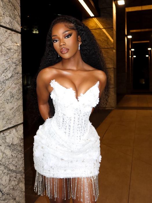 White Short Elizabeth — White three-dimensional florals over a boned corset, finished with a crystal fringe hem.